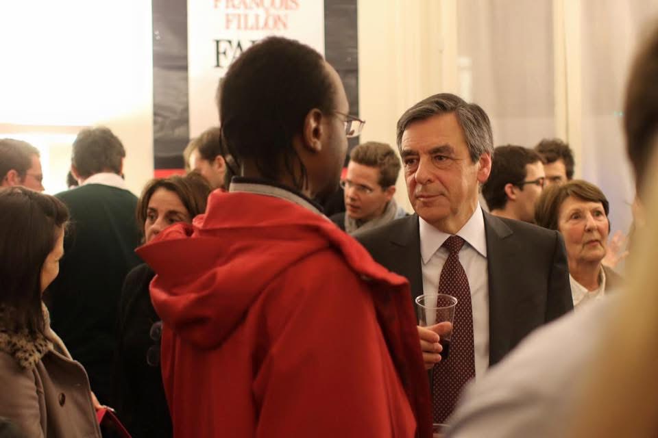 Un échange lors d’une rencontre publique